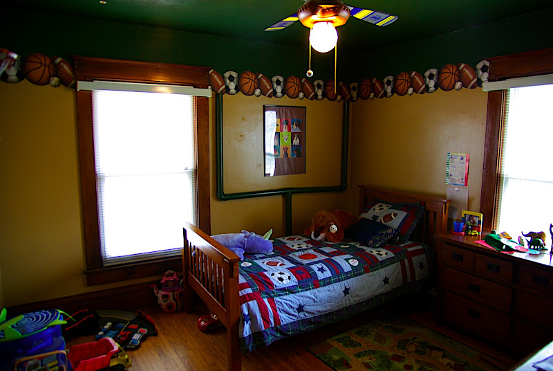 Another bedroom...well take down the fan and wall paper, and then paint the walls.  This will be another guest room.