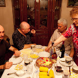My dad talks with Yefim, while his wife, Valentina serves a meal at their home -- relatives whom I last saw when I was five years old