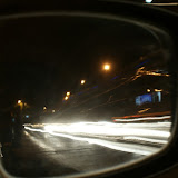 This is a 5 second exposure of the side rear view mirror with the camera in the hand