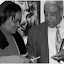 -JIS/NY Photo-
Deputy Consul General of Jamaica in NY, Lisa B. Smart and Vincent Heath, co-chair of Team Jamaica Bickle-
Philadelphia Organizing Committee, discuss the upcoming reggae concert on Sunday, April 20, 2008 at 7pm, at the
Brooklyn Center for the Performing Arts,Brooklyn College, Brooklyn, NY during last week’s press briefing/reception at the
offices of Ruder Finn Agency, 301 Second Avenue, Manhattan. The concert event dubbed “Team Jamaica Bickle on the Road
to Beijing”, which will be staged under the patronage of Jamaica’s newly appointed Ambassador to the USA, His Excellency
Anthony Johnson, will benefit Jamaica’s student/athletes attending the April 24-26, 2008 Penn Relays Carnival in
Philadelphia, Pennsylvania and the national senior team to the Games of the 29th Olympiad in Beijing, China, from August
8-28, this year. In his brief to the media, TJB Founder Irwine Clare, Sr., said that the April 20 event which is being supported
by the VP Records Family, will be more than just a concert event. -JIS/NY Photo-
Deputy Consul General of Jamaica in NY, Lisa B. Smart and Vincent Heath, co-chair of Team Jamaica Bickle-
Philadelphia Organizing Committee, discuss the upcoming reggae concert on Sunday, April 20, 2008 at 7pm, at the
Brooklyn Center for the Performing Arts,Brooklyn College, Brooklyn, NY during last week’s press briefing/reception at the
offices of Ruder Finn Agency, 301 Second Avenue, Manhattan. The concert event dubbed “Team Jamaica Bickle on the Road
to Beijing”, which will be staged under the patronage of Jamaica’s newly appointed Ambassador to the USA, His Excellency
Anthony Johnson, will benefit Jamaica’s student/athletes attending the April 24-26, 2008 Penn Relays Carnival in
Philadelphia, Pennsylvania and the national senior team to the Games of the 29th Olympiad in Beijing, China, from August
8-28, this year. In his brief to the media, TJB Founder Irwine Clare, Sr., said that the April 20 event which is being supported
by the VP Records Family, will be more than just a concert event.