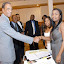 GREETINGS: Anthony Johnson, Jamaica's ambassador to the
United States greets Nadra Thomas, Marsha Wignall and other
members of Generation 2000 (G2K) at a recent welcome party
held at The Elegant Rose Hall, Bronx NY in honor of the ambassador.