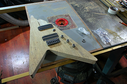 Proto 2 with the hardware roughly in place. Controls: Kill switch, master volume, blend pot, master tone. Pickpus: Lace Alumitone 4" Tone Bars. Bridge: ABM.
