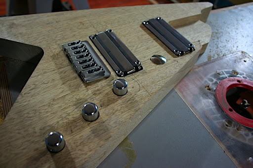 I mistakenly thought the 4" wide Lace Alumitone Tone Bars would be required, but it looks like the 3.5" ones would do for a 7-string guitar. I believe this may be the first time these have been used in a 7-string guitar application.