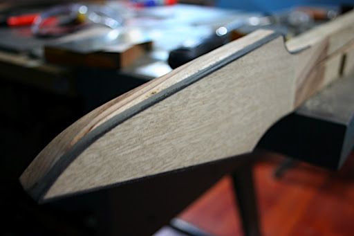 After scraping and sanding it flush. Next time, i'm using a smaller template bearing so the binding will be set almost flush, requiring much less scraping.