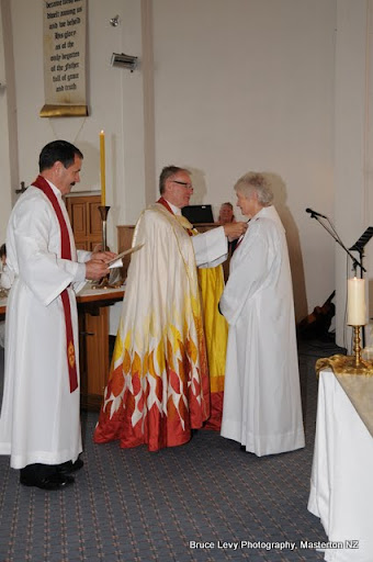 Bishop presents medal to April Bamford