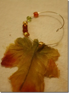 beads then leaf on hoop