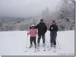 Annalise, Roneil, and Julianne at the top of the mountain