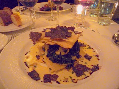 Napoleon of Wild Mushroom & Perigord Truffle and sautéed spinach, cauliflower, grilled quince and truffled pine nut anglaise
