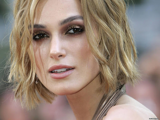 Keira Knightley (in Chanel Haute Couture) attends the premiere of her latest