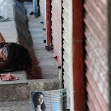 A man taking rest as shops remain closed due to the imposition of curfew in Hyderabad on Tuesday.
