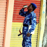 A policeman quenching his thirst in the Hyderabad old city. About 1800 paramilitary forces have been deployed to calm the situation.