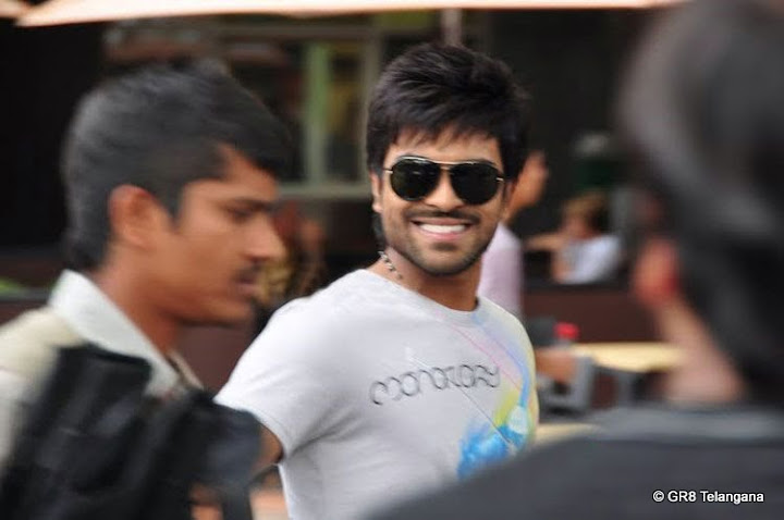 Ram Charan S Orange Working Stills In Pics Gr8 Telangana