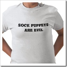 sock_puppets_are_evil_tshirt-p235447368977677879t58d_210