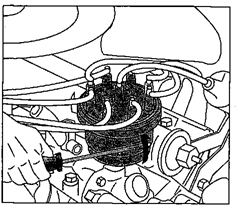 Removing a distributor cap with clips.