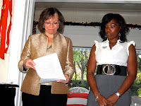 Leah Uko (UC Riverside) receives the Larry McCormick scholarship from Lois Pitter Bruce.