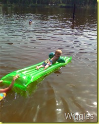 Aaron on float in lake