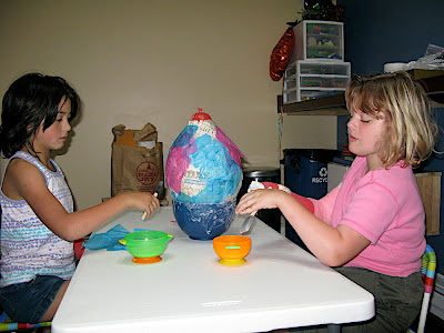 Look at our helper hands in the pinata gook! Slimy yet satisfying.