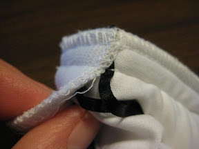 Sew new strap to front