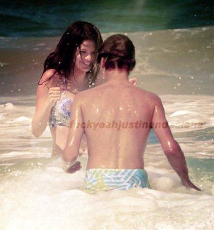 Justin and Selena frolicking on the beach in St. Lucia