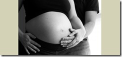 pregnant_tummy_with_dad_s_hands__labor_doula__wh4y