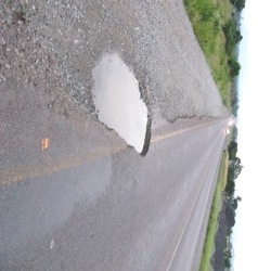[Pothole R511 to Brits 28Jan2010 Dolf Dreyer MadibengPulse[5].jpg]