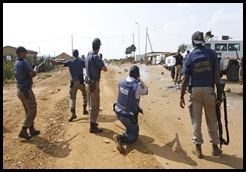 Phomolong township Pretoria cops rubberbullet stonethrowers Mar232010 Lisa HnatowiczBeeld