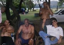 [McBride Robert and Ekhurhuleni metrocops Dec2005 party.jpg]
