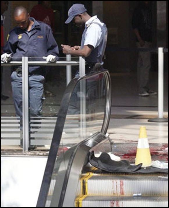 Two SA cops supposedly stand guard at scene of doublemurder in cash-transit robbery Lenasia Aug122009BeeldPic