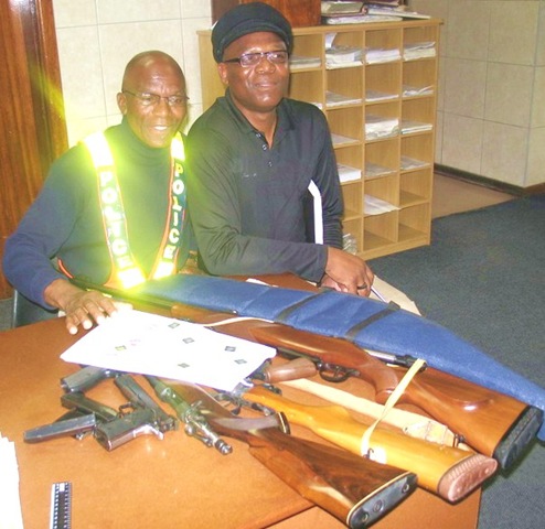 [East London police recovered firearms Insp Zolile Mbambo, Colin Smith Sept 24 2009[7].jpg]