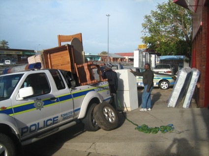 [Murdered taxiowner Sam Kundayi recovered furniture offloaded Despatch Aug142009[5].jpg]