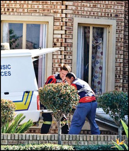 Schonken Isabel farm murder body loaded into forensics van Sept 26 2009 Beeld