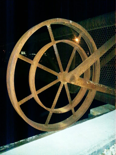 Bronze Wheel Art on Removable Bridge
