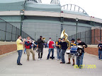 Photo: The street musician joins the Kingpin Brass Band for a hot tune.