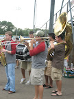 Photo: Mike shows the crowd how to play the brass band bone.