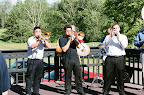 Photo: The brass band let's loose on the deck to start the party off.