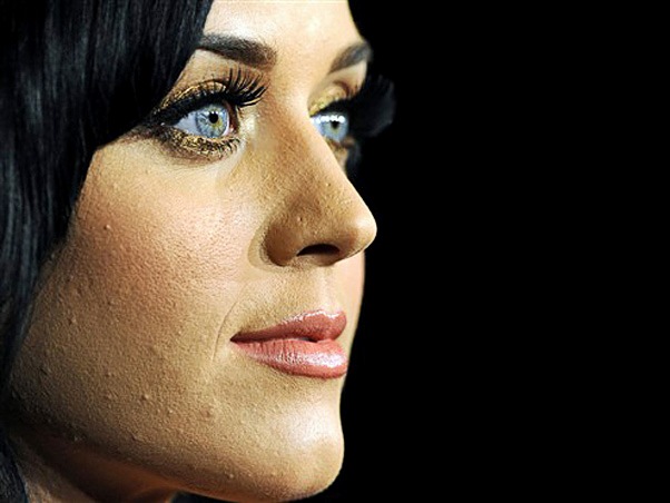 Pop star Katy Perry poses in the press room at the Grammy Nominations Concert, December 1, 2010 at Club Nokia in downtown Los Angeles. The 53rd annual Grammy Awards show will take place in Los Angeles on February 13, 2011. AFP PHOTO  GABRIEL BOUYS