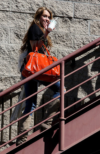 IMAGE ID # 2025748 Miley Cyrus and her crew stop off to grab a bite to eat at an In and Out Burger before heading over to a recording studio in Burbank Ca! CR: RIV/ Fame Pictures 03/23/2009 --- Miley Cyrus --- (C) 2009 Fame Pictures, Inc. - Santa Monica, CA, U.S.A - 310-395-0500 / Sales: 310-395-0500