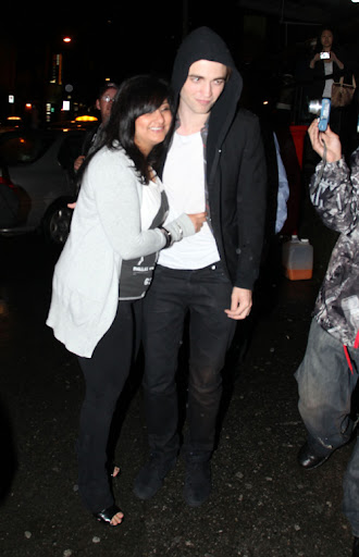 IMAGE ID # 2193064 Robert Pattinson celebrates his 23rd birthday in Vancouver, BC, Canada Wednesday night. Fans endured the rainy weather for a chance to see Robert and he was gracious enough to pose with a few of them before leaving. Despite his last year being a life-changing one for the young heartthrob, Pattinson remained somewhat subdued while celebrating his birthday with castmates and friends. 05/14/2009 --- Robert Pattinson --- (C) 2009 Fame Pictures, Inc. - Santa Monica, CA, U.S.A - 310-395-0500 / Sales: 310-395-0500
