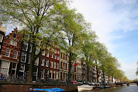 Houses and trees along the canal
