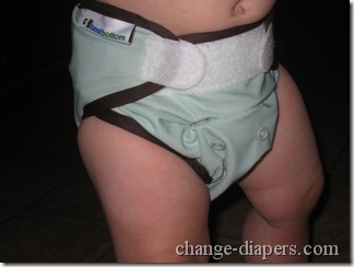 medium diaper system on baby