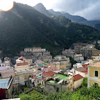 The sun peaks out of the clouds over Amalfi.