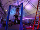 Our girls are inspired by this 7-year old kid doing the silks!