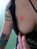 Vince Neil's boobalicious handiwork.