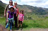 Another poor tourist is forced to take a picture of us.