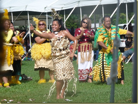 Liahona student dances a welcome to the queen mother