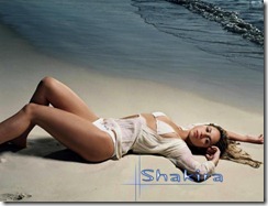 shakira-white-bikini-lying-on-beach