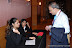 A delegate being assisted at the helpdesk at the NILF 2009 event