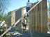 The plywood base from the panels are unscrewed to be reused on the next batch of walls