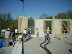 The final prefabricated straw bale wall panel is put in place
