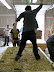 A bale dance helps embed the buttered bales into the plaster in the form